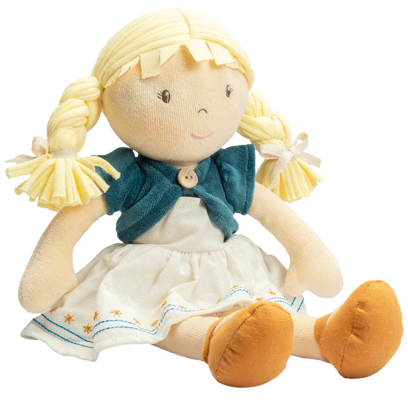 Plush doll with blonde hair, blue sweater, and white dress on a white background