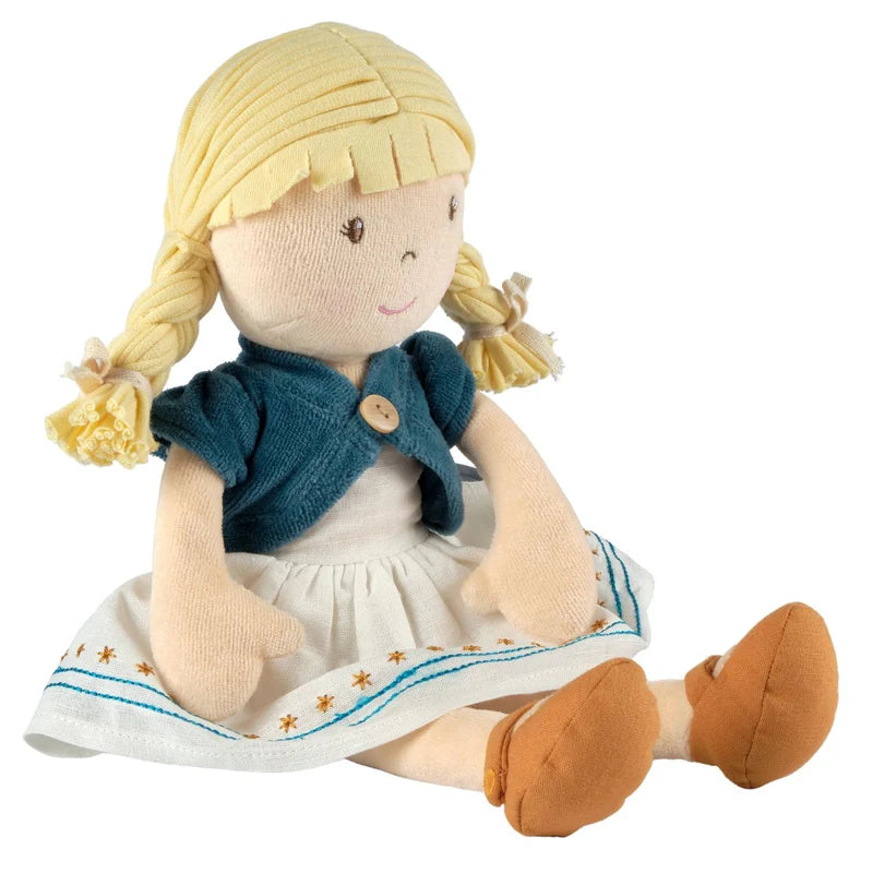 Plush toy doll with blonde hair, blue scarf, and white dress on a white background