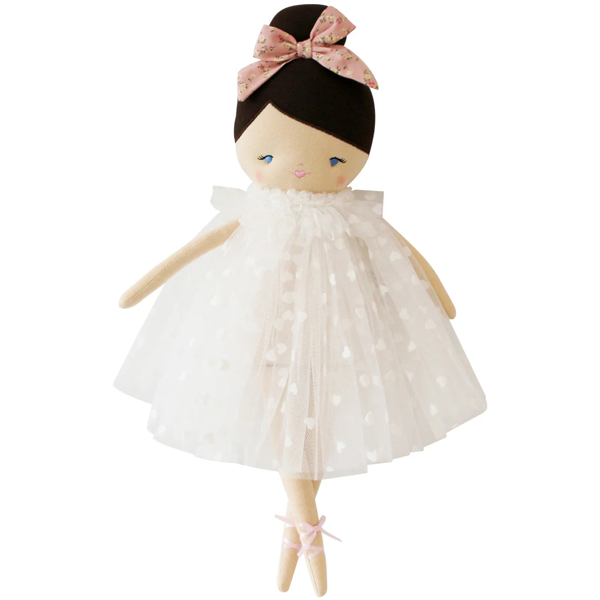 Doll with a white dress and pink bow on a white background