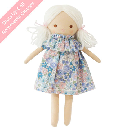 Doll with a floral dress on a white background