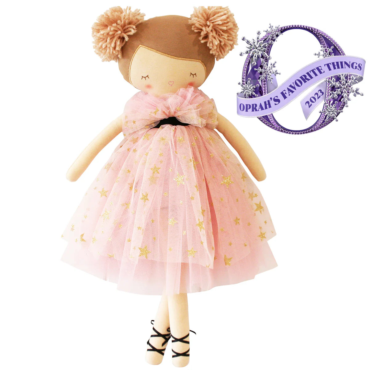 Doll in a pink dress with gold stars, wearing a headband with pom-poms, on a white background with 'Oprah's Favorite Things' label.