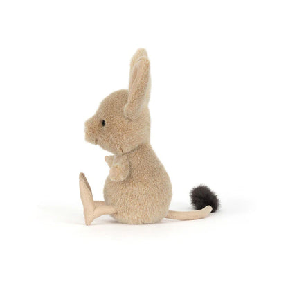 Stuffed animal mouse sitting on a white background