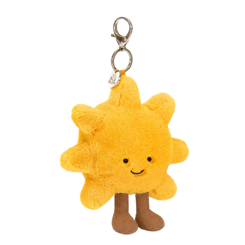Jellycat Plush sun-shaped keychain with a smiling face on a white background