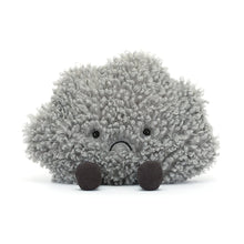 Plush toy resembling a grey storm cloud with a sad expression on a white background
