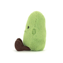 Plush green soft toy resembling a bean on a white background