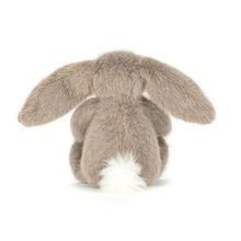 Plush Jellycat toy rabbit with large ears and white cottontail on a white background