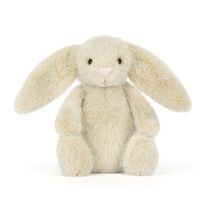 Plush bunny toy on a white background