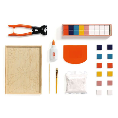 Set of craft supplies including a wooden panel, pliers, paint colors, and tools on a white background.