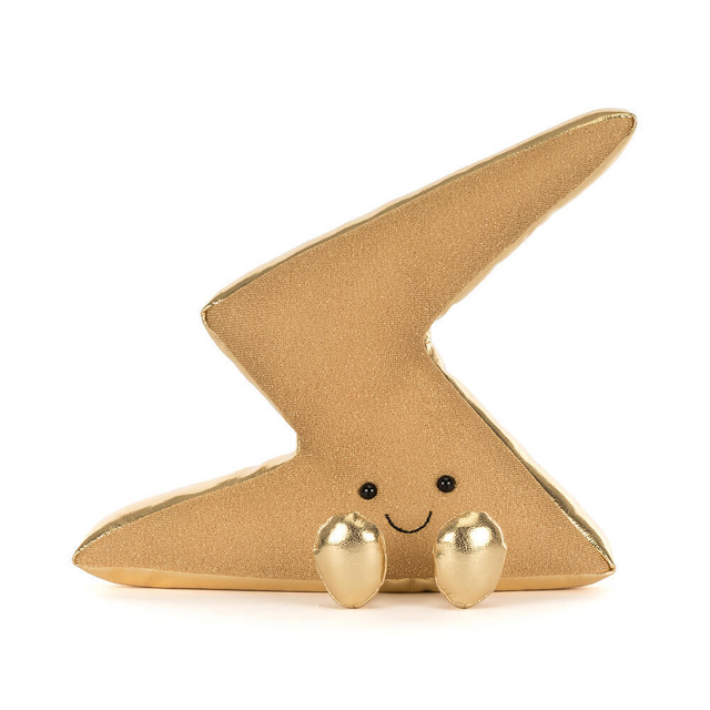 Gold soft toy resembling a lightning bolt with smiling face, on a white background