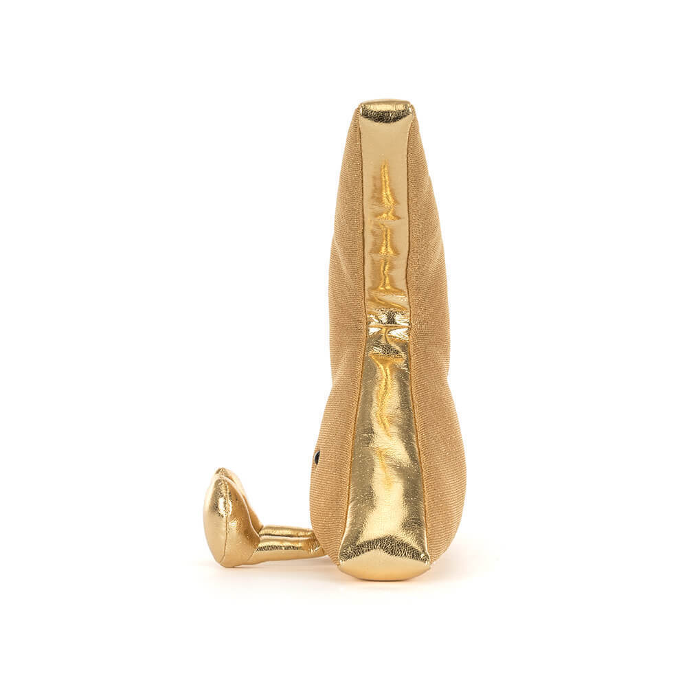 Gold soft toy resembling a lightning bolt on a white background
