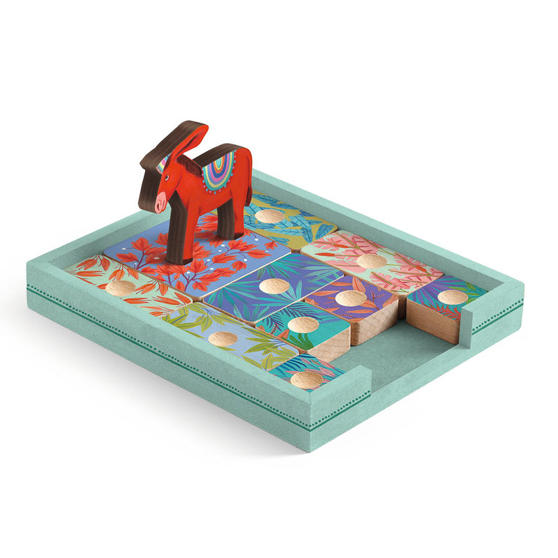A colorful board game featuring a red donkey piece and various game pieces with floral patterns on a teal board.