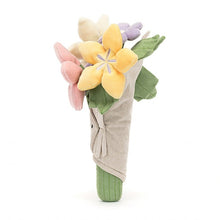 Plush toy resembling a bouquet of flowers with pastel colors on a white background