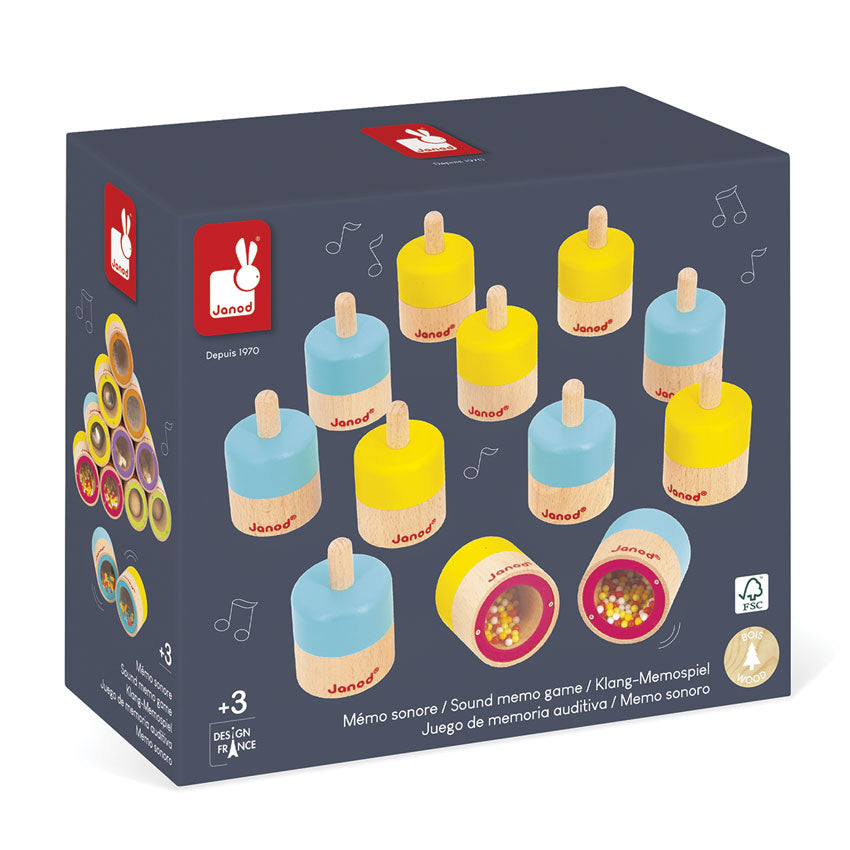 Box of Janod wooden memory game with colorful cylindrical pieces on a white background