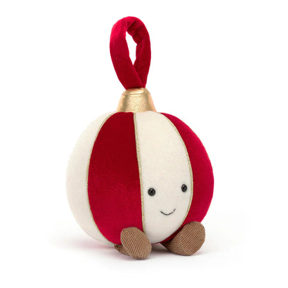 Red and cream Christmas bauble shaped Jellycat soft toy with smiling face