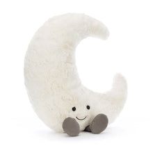 Plush toy shaped like a crescent moon with a smiling face on a white background