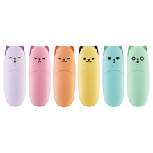 Set of six colorful cat-shaped stationery items on a white background