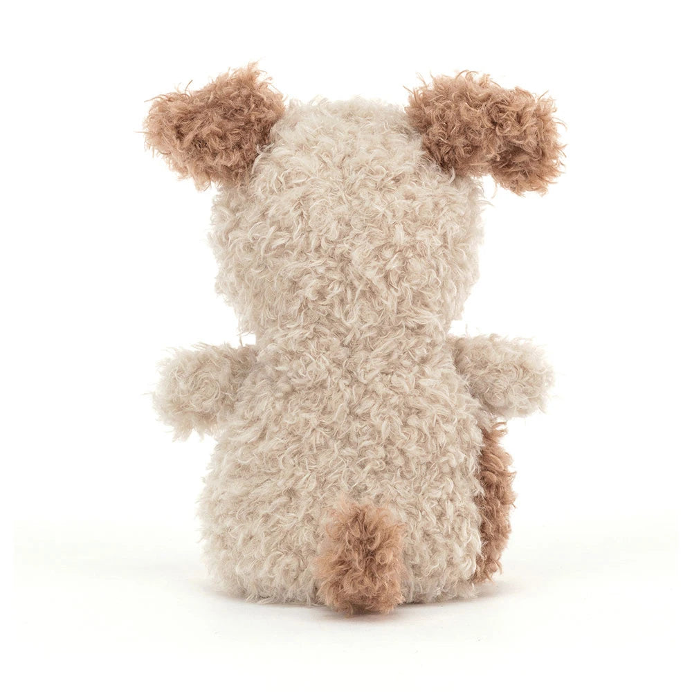 Stuffed animal plush toy resembling a puppy on a white background