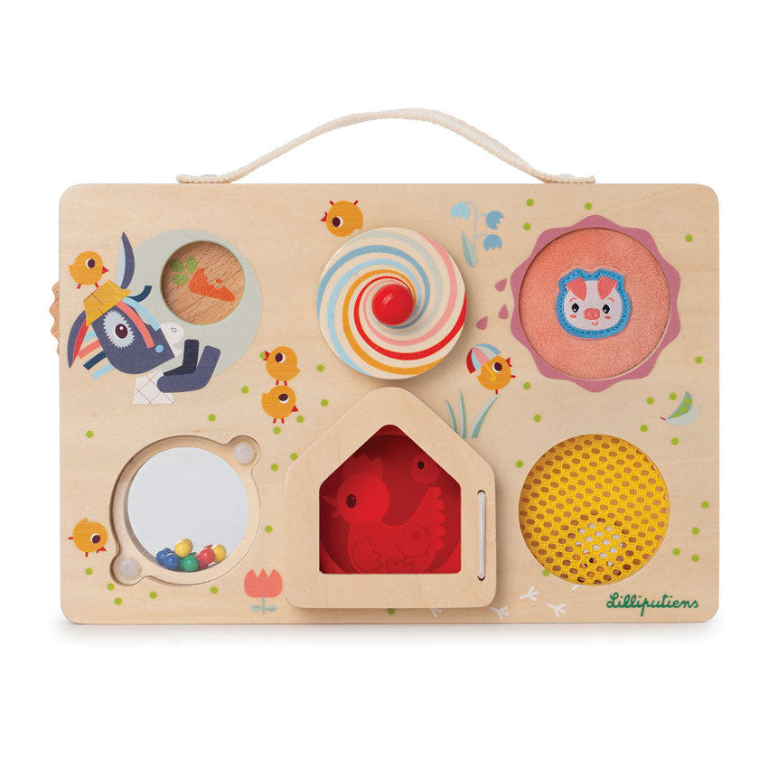 A wooden farm-themed discovery board with various interactive elements such as spinning wheels, a house, and farm animals.