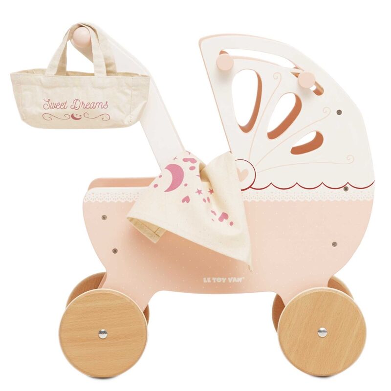 Pink doll pram with canopy and basket on a white background