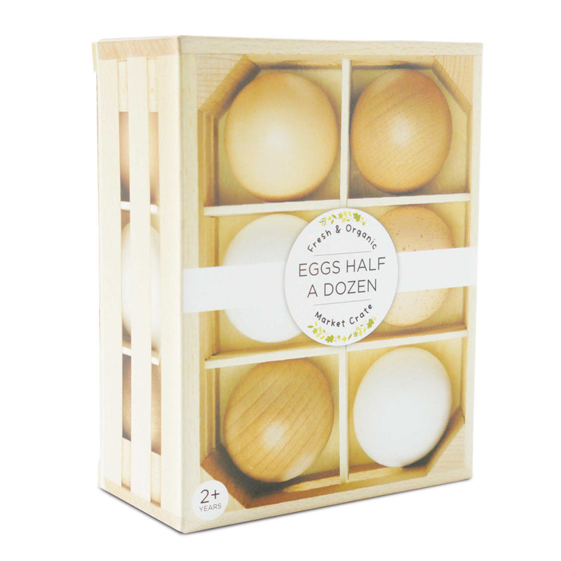 Packaging of wooden toy eggs labeled 'Eggs Half a Dozen' with a wooden crate design.