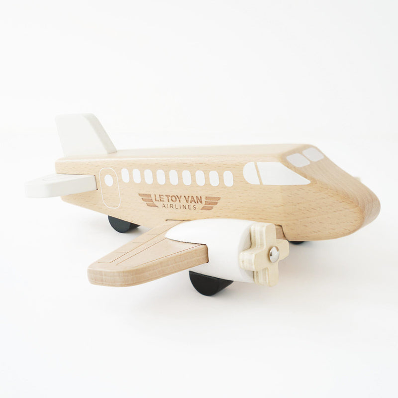 Wooden airplane toy with 'Letoy Van Airlines' branding on a white background