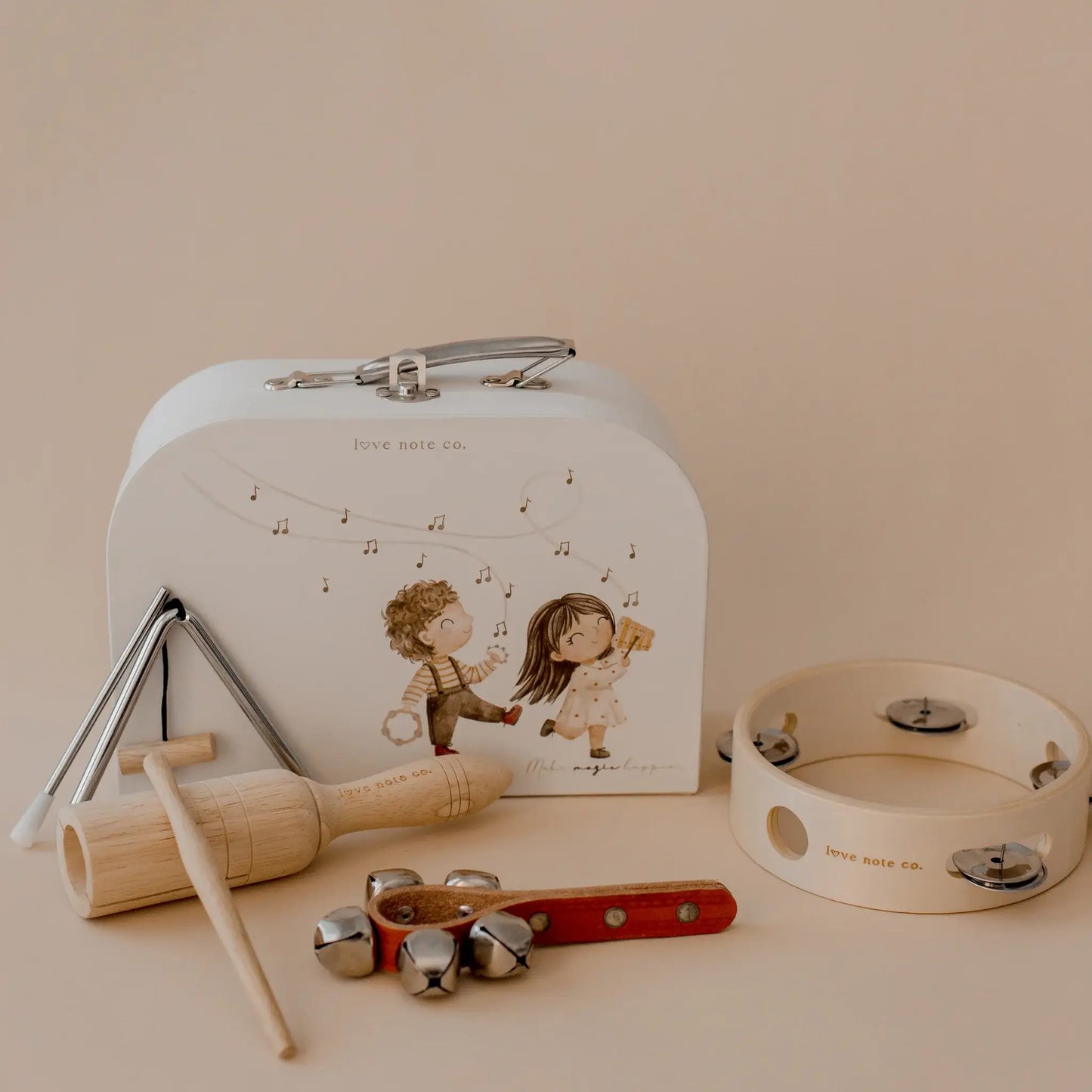 Love Note Co Little Sounds Music Set with illustrated case, tambourine, triangle and handbells.