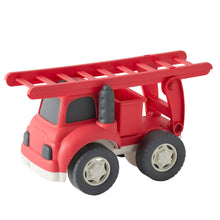 Red toy fire truck with a ladder on a white background