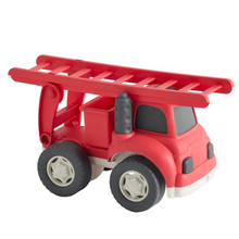 Red toy fire truck with a ladder on a white background