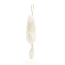 White decorative hanging ornament on a white background