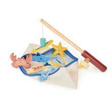 A wooden fishing game set including a fishing rod with a magnetic end and seven sea creature pendants, displayed in a zipped pencil case.