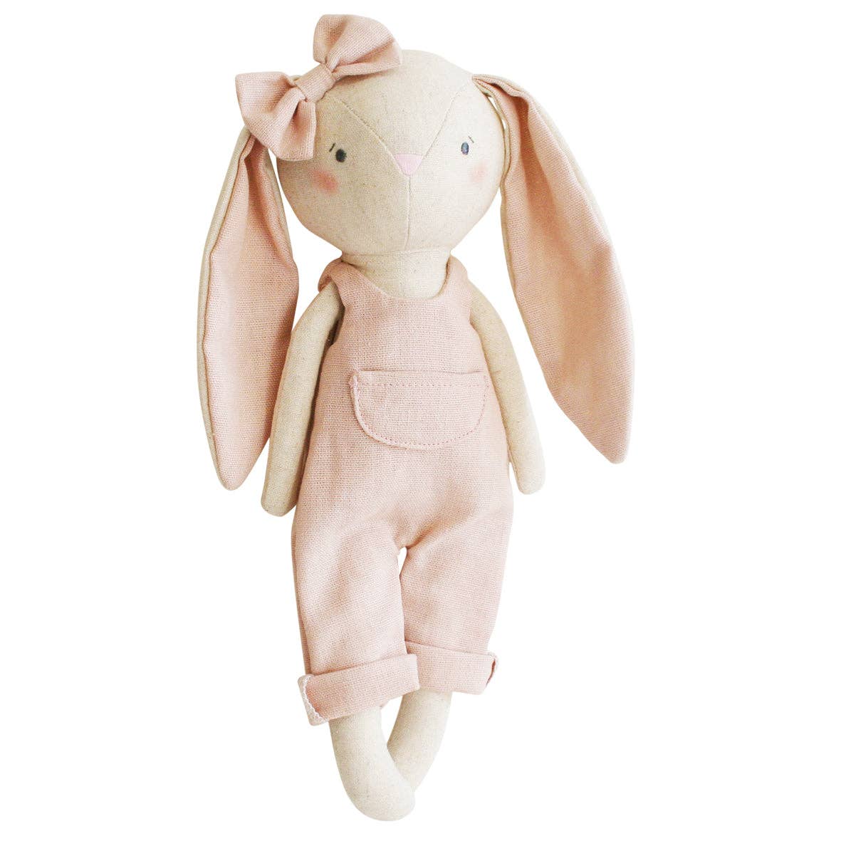 A pink Olivia Bunny doll with beige ears and a bow on its head, dressed in a linen overalls.