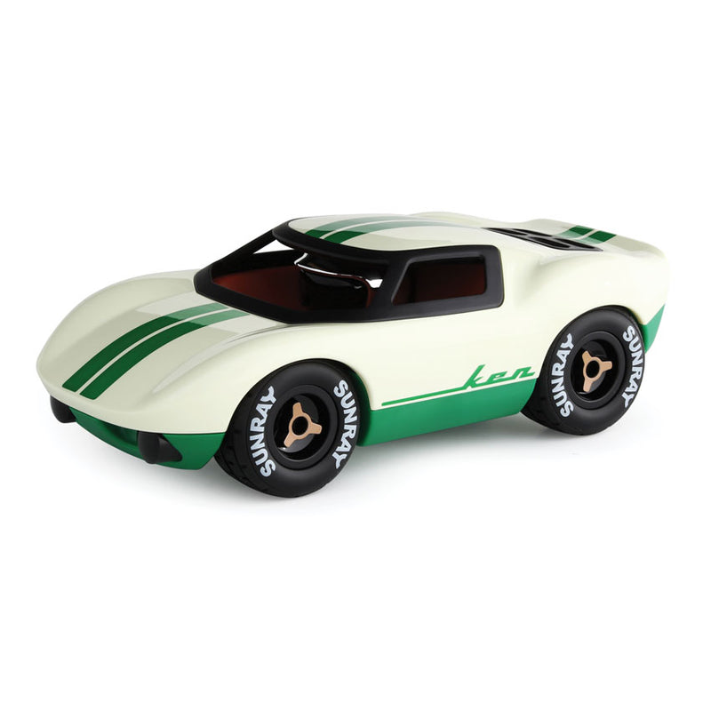 Model car with green and black accents on a white background