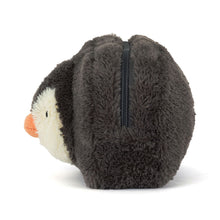 Plush penguin toy with a zipper on a white background