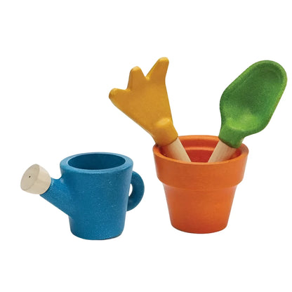 blue wooden watering can orange wooden floer pot, yellow kids garden trowel and green kids spade - Plantoy wooden gardening playset