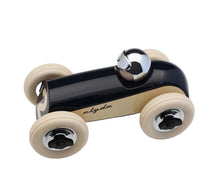 Toy car with black body and beige wheels on a white background
