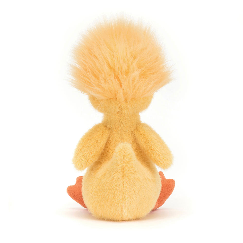 A plush toy depicting a yellow duckling with a fluffy mane and an orange beak and feet.