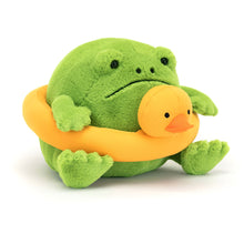 A plush green frog with a big frown holding a bright yellow rubber duck ring.