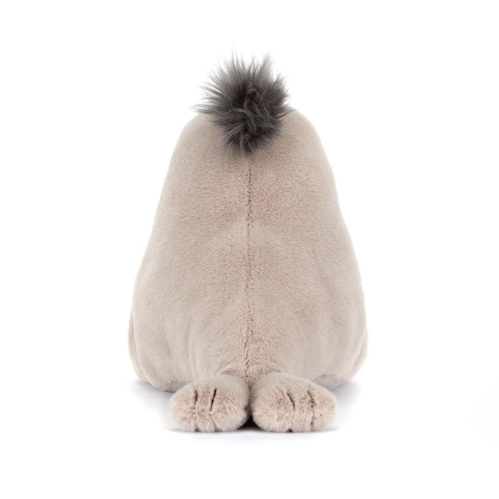Plush toy with a fluffy tail on a white background