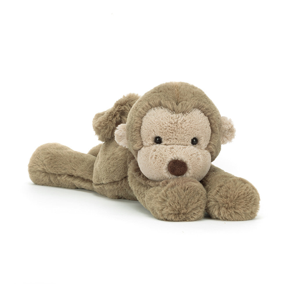 Plush monkey plush toy on a white background