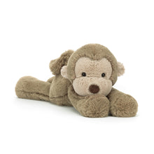 Plush monkey plush toy on a white background