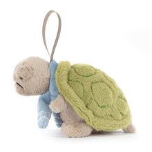Plush turtle soft toy with a green shell on a white background, Jellycat brand.
