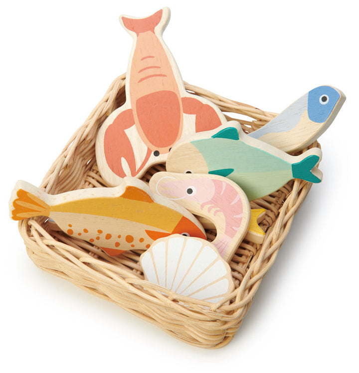Small pretend play wicker basket filled with wooden fish items - Tender Leaf toys at Send A Toy