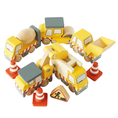 Set of wooden toy construction vehicles on a white background
