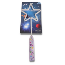 A packaged toy star wand with a handle that has multicolored stars, marketed by Discovery Zone, against a space-themed backdrop.