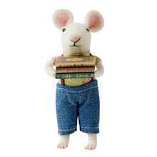 Handmade wool felt mouse figurine wearing overalls and holding a stack of books