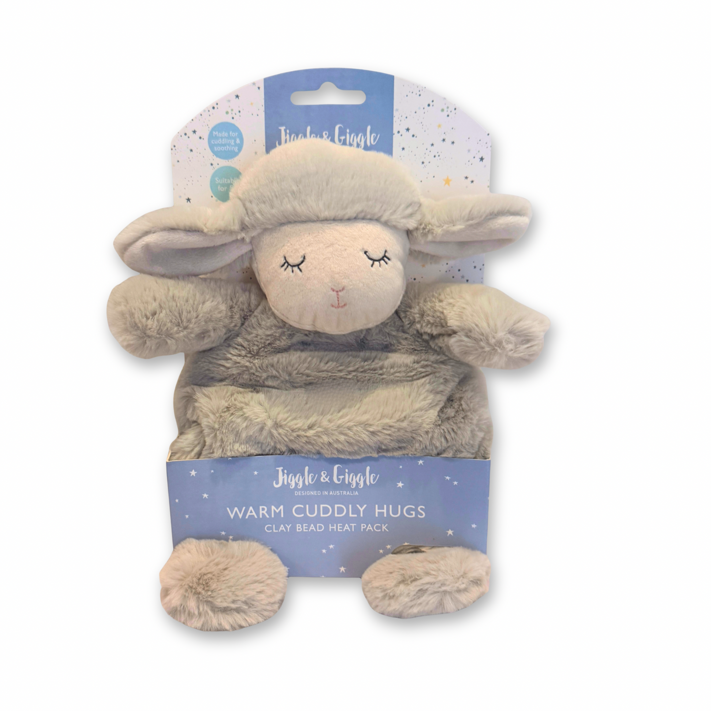 Plush lamb toy with clay bead heat pack on a white background