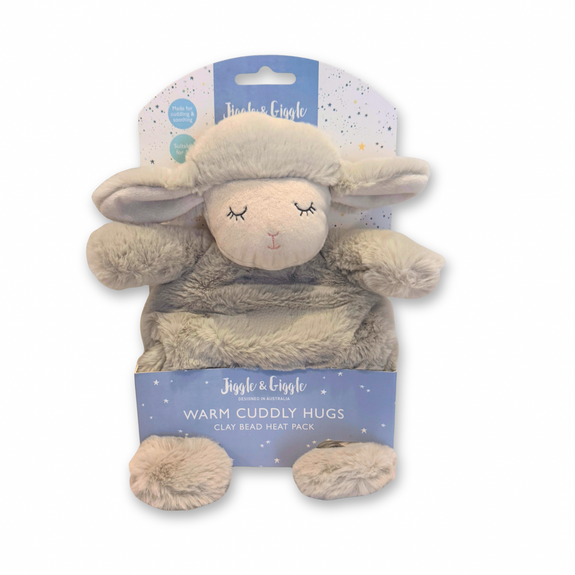Plush lamb toy with clay bead heat pack on a white background