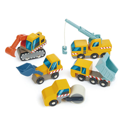 Small yellow wooden construction vehicle toys, tipper truck, digger, grader, crane and roller