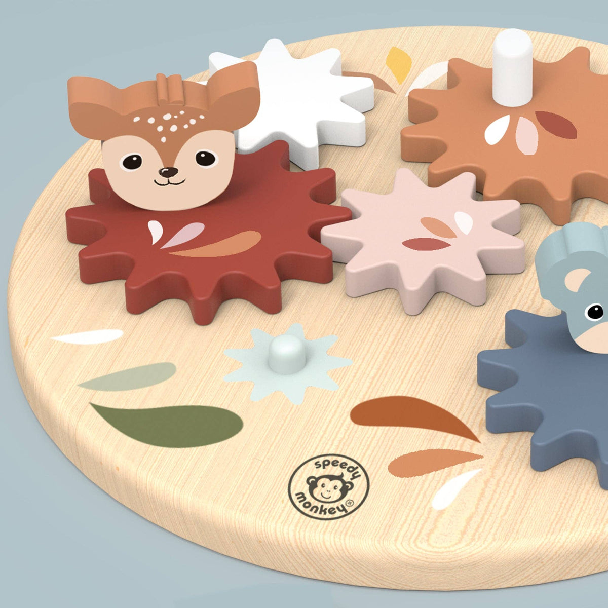 Wooden puzzle with animal-shaped gears on a circular base
