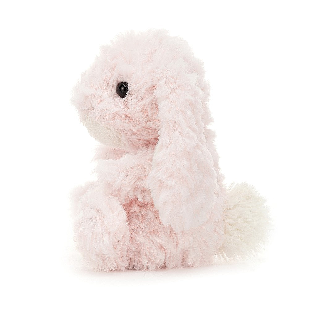 Small light pink bunny soft toy with white tail